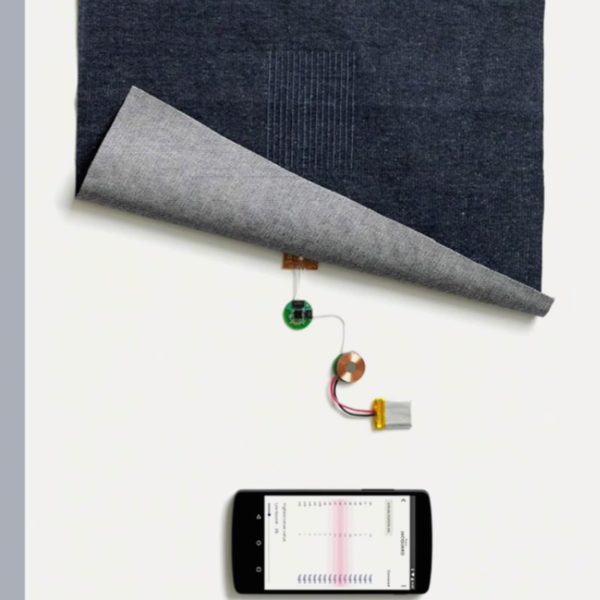 Smart Textile mit integrierten elektronischen Komponenten und Smartphone-App zur Messung und Auswertung textiler Sensordaten.